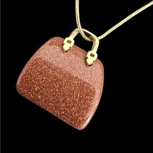Brown druzy Quartz  purse pendant plus a gold plated necklace